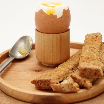 wooden egg cup in use