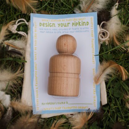 wooden peg doll with design card