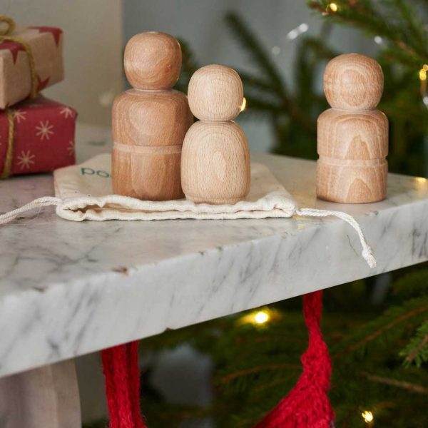 pipkind wooden peg dolls on a christmas mantlepiece
