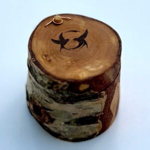 Silver birch wood ring box with a pair of swallows in flight engraved on the lid.