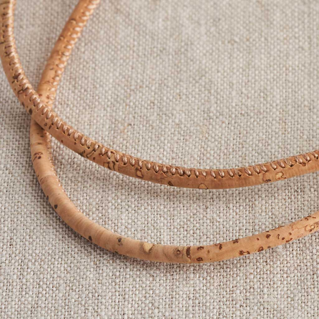 How to secure your cork cord necklace with a reef knot video