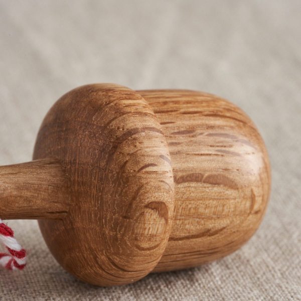 wooden acorn ornament detail