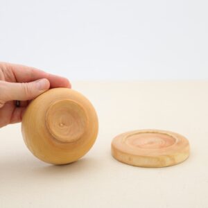 bottom of a small wooden bowl