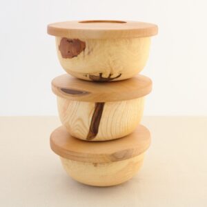 stacking wooden bowls with lids