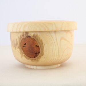 large wooden bowl and plate set