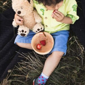 wooden bowl with strawberries in