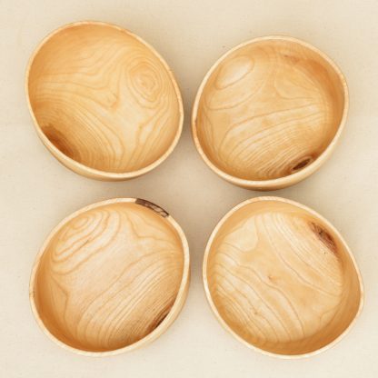 set of oval wooden bowls