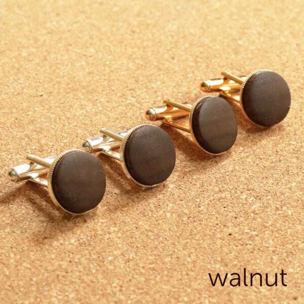 Exquisite wooden cufflinks, lovingly made by hand, providing a unique and eco-friendly addition to your formal ensemble.