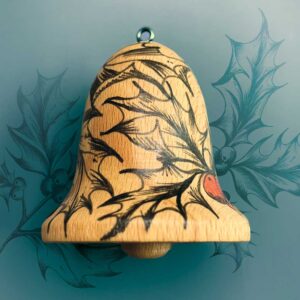 side of a decorated beech wood bell christmas decoration