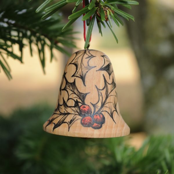 wooden bell christmas ornament with hand drawn holly illustration