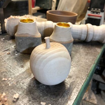 small spindle turned apple and candlesticks