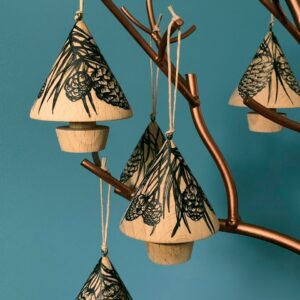 A group of Scots Pine hangiing baubles