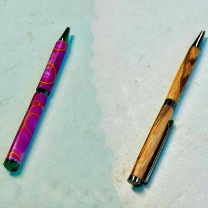 wooden pen and acrylic pen turned on the lathe