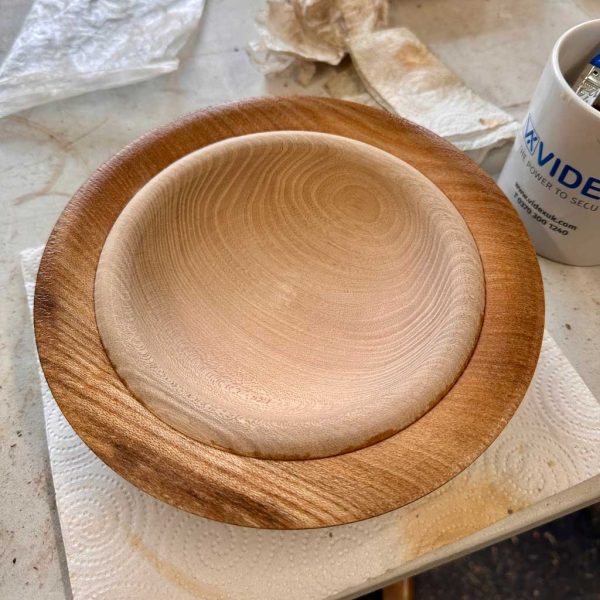 Ebonising the rim of an elm bowl.