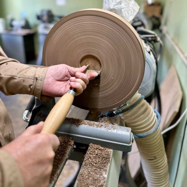 Hollowing the inside of a large walnut bowl.