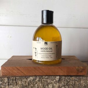 A bottle of 100% natural wood oil made by Natasha Craig
