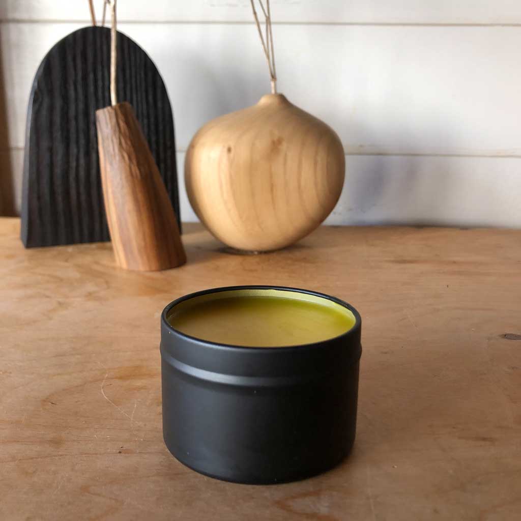 black tin of natural blended beeswax for wood