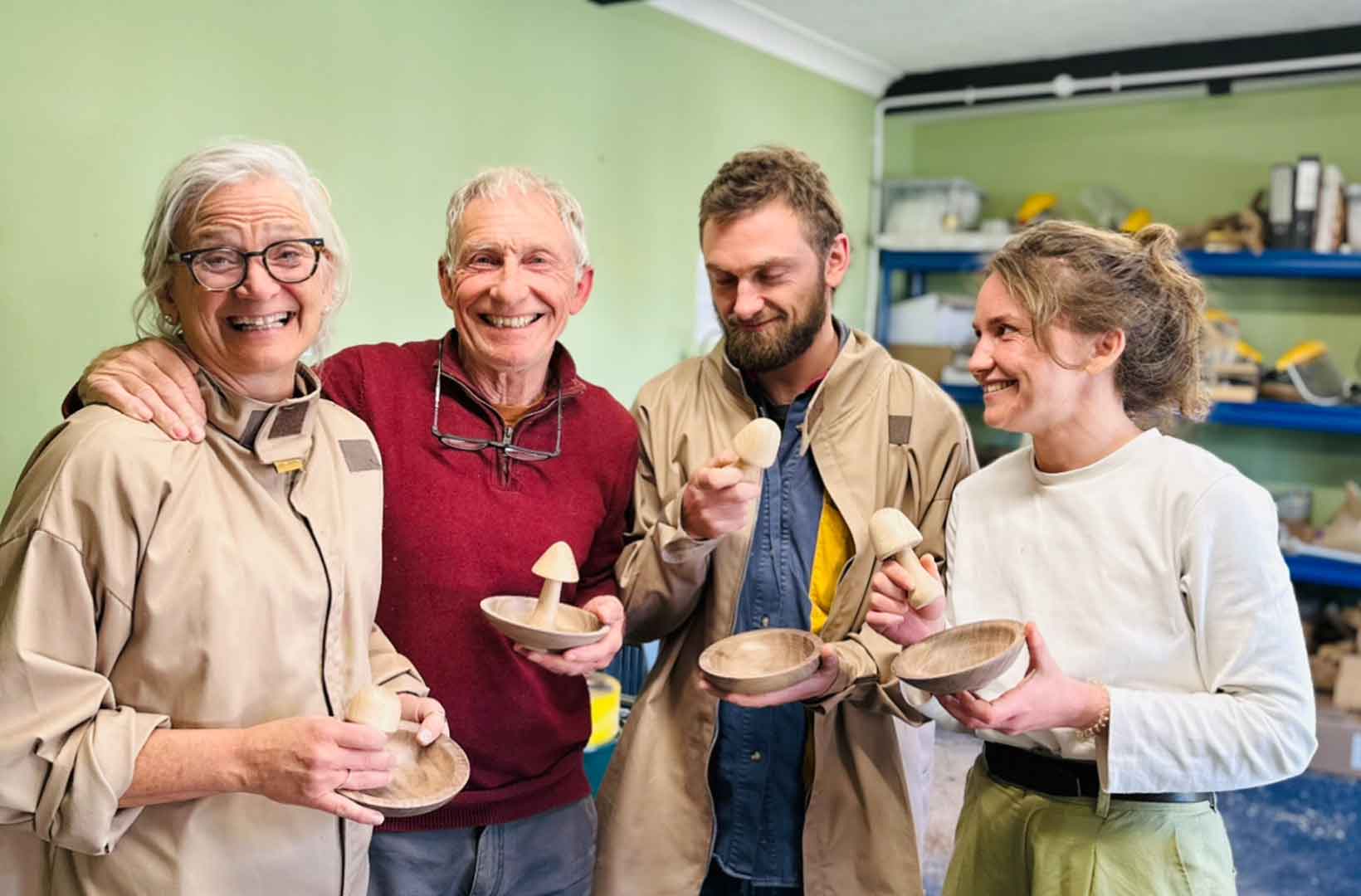 Happy family having a woodturning day at Love Heartwood.