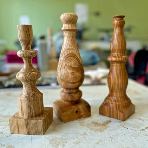 A selection of unique handmade wooden table lamps designed and made by students.