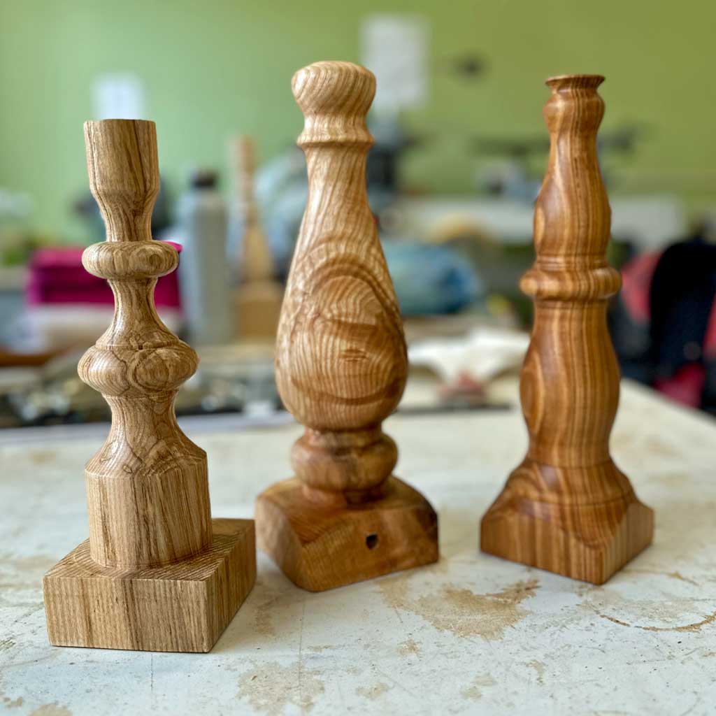 A selection of unique handmade wooden table lamps designed and made by students.