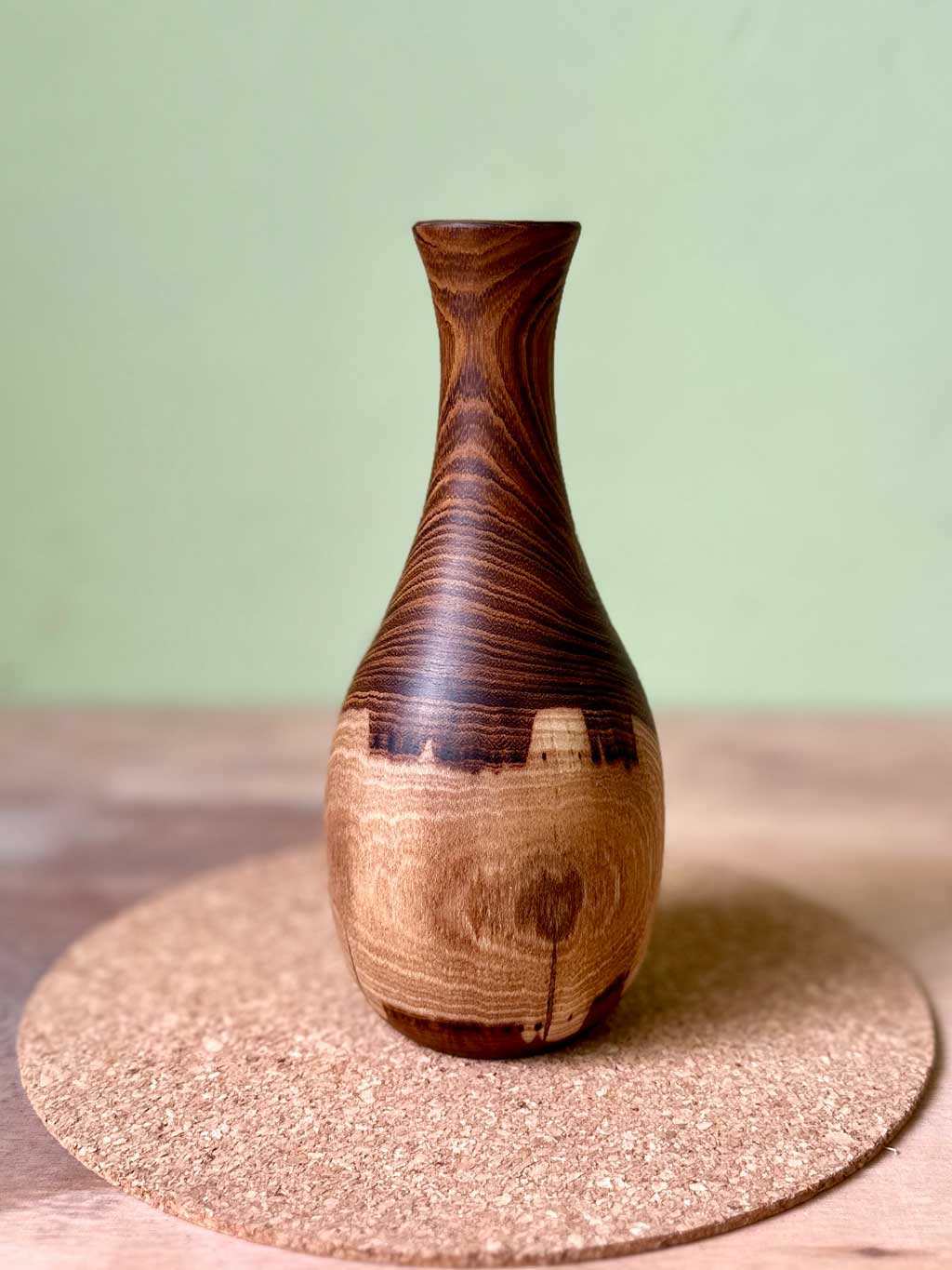 Laburnum bud vase with tall neck and bulbous base.