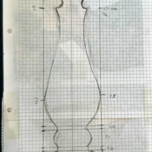 Pencil profile drawing of a table lamp design on graph paper