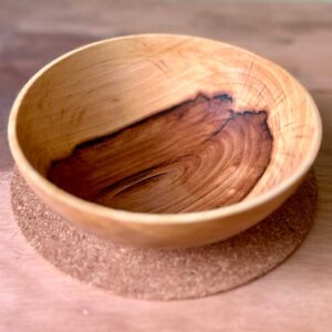 Interior of the Rooted vessel showing dramatic natural rowan heartwood.